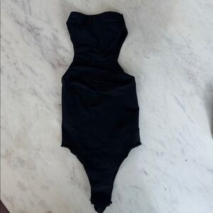 SKIMS onyx sleeveless turtleneck bodysuit in size xs